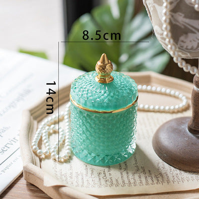 Luxury fine cut glass jar with gold point top.