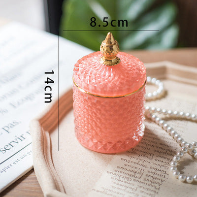 Luxury fine cut glass jar with gold point top.