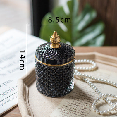 Luxury fine cut glass jar with gold point top.