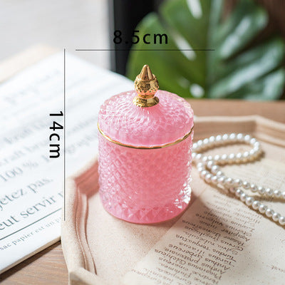 Luxury fine cut glass jar with gold point top.