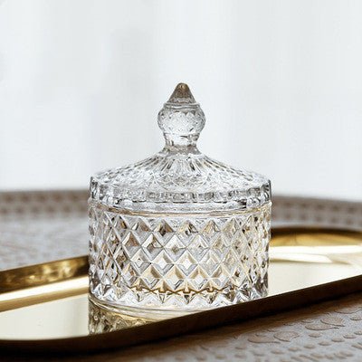 Luxury fine cut glass jar with gold point top.