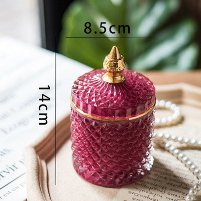 Luxury fine cut glass jar with gold point top.