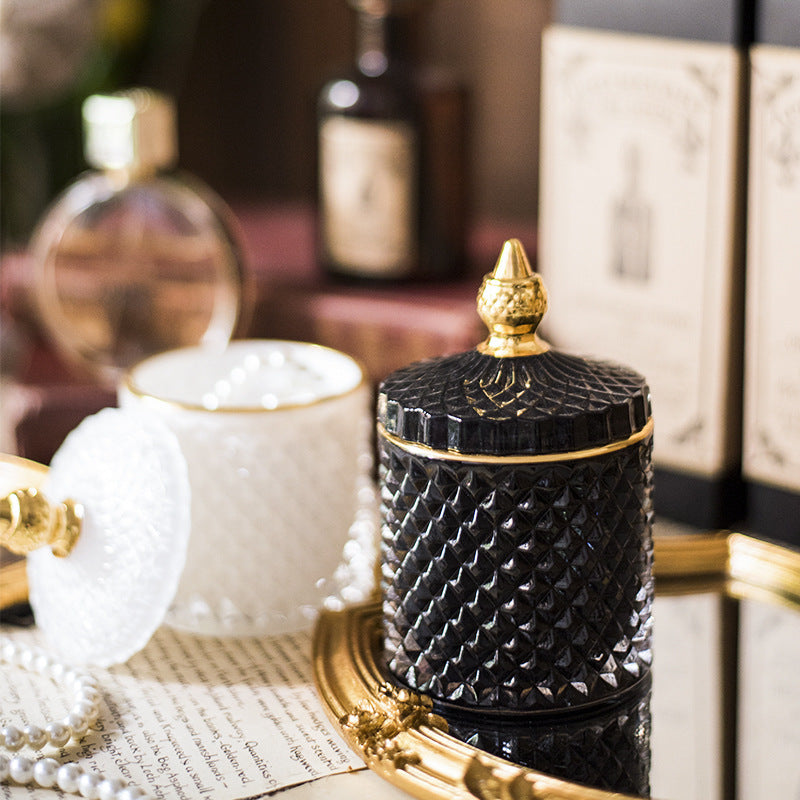 Luxury fine cut glass jar with gold point top.