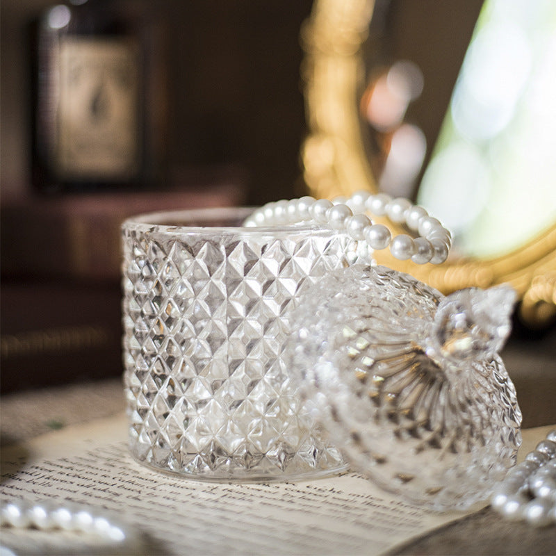 Luxury fine cut glass jar with gold point top.