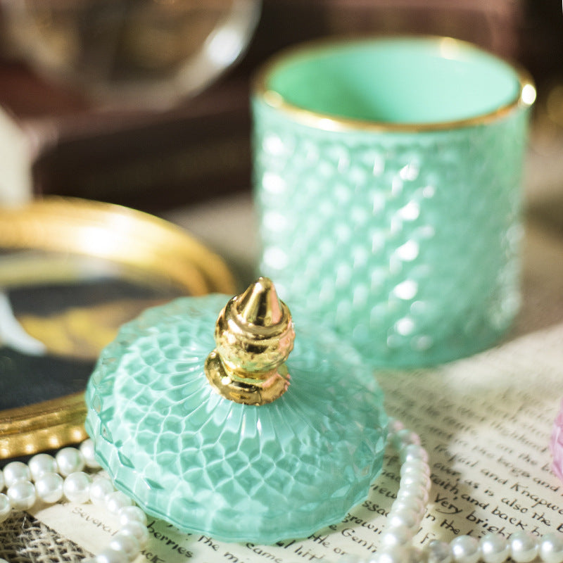 Luxury fine cut glass jar with gold point top.