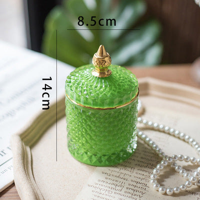 Luxury fine cut glass jar with gold point top.