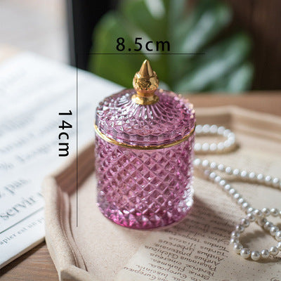Luxury fine cut glass jar with gold point top.
