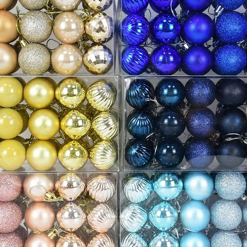 Adorno de bolas navideñas de plástico en caja, en colores rosa y dorado surtidos.