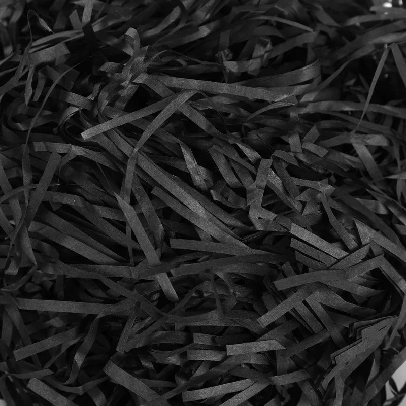 Riempimento per scatole regalo di caramelle in carta crespa triturata color rafia.