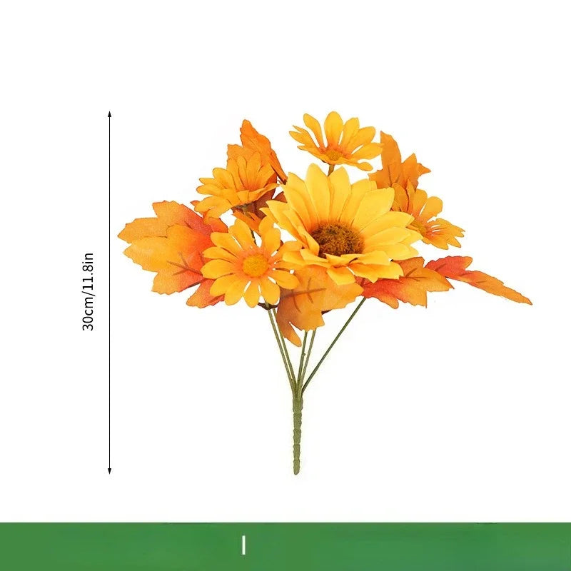 Ramo navideño de naranjas, girasoles artificiales y hojas de arce