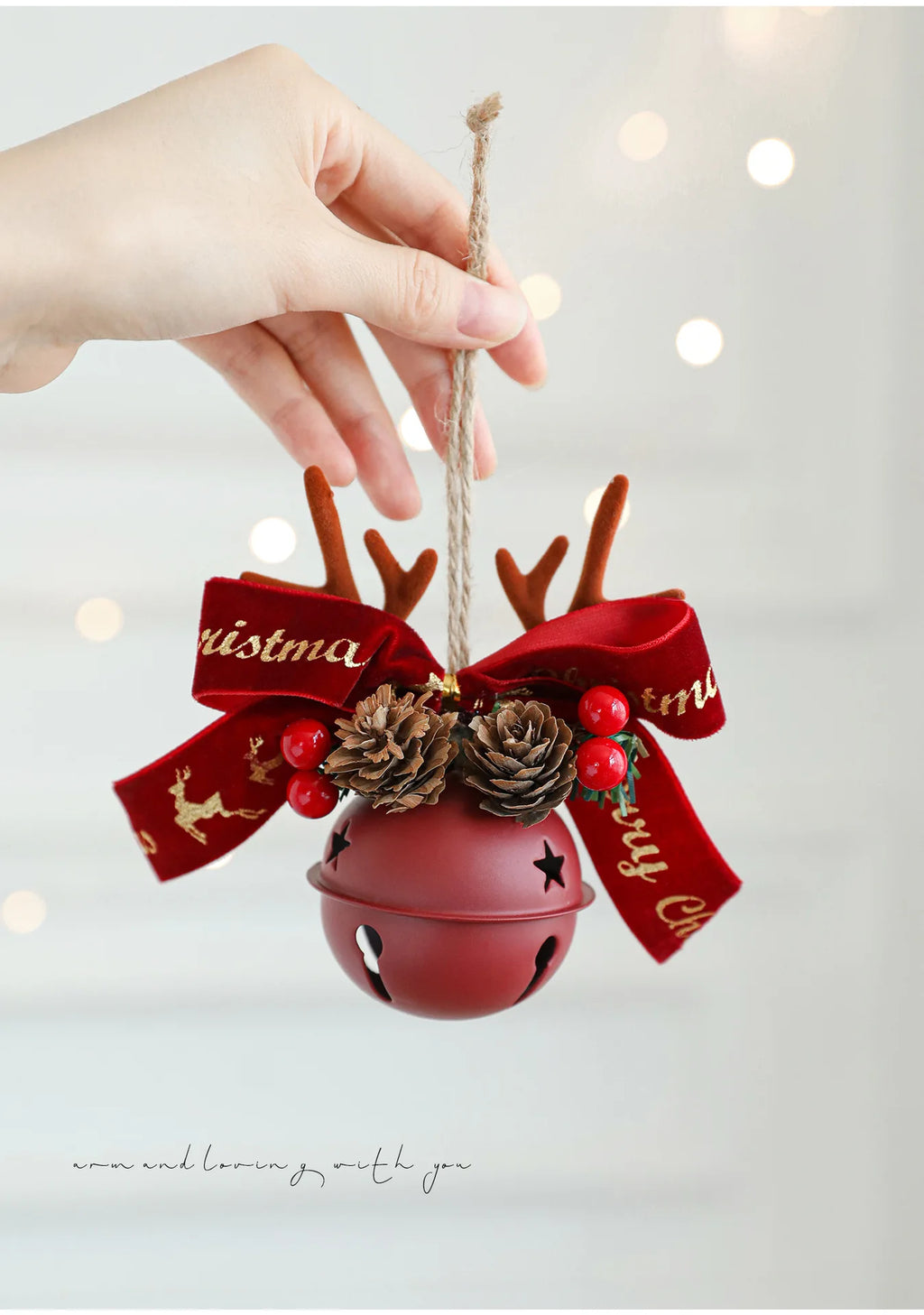 Christmas bells antlers bows pinecones Christmas tree.