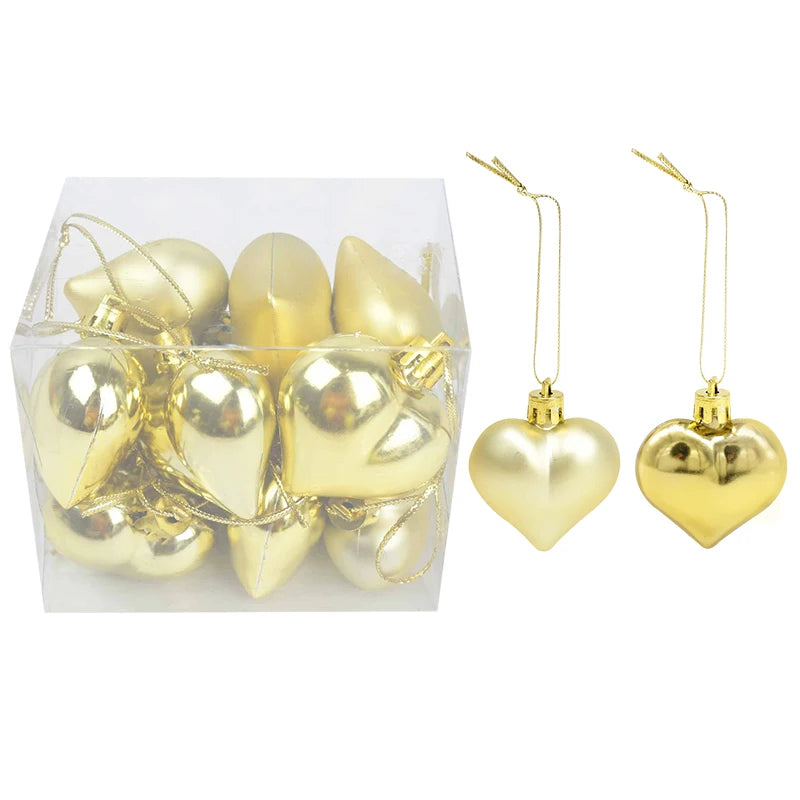 Adorno de bolas navideñas de plástico en caja, en colores rosa y dorado surtidos.