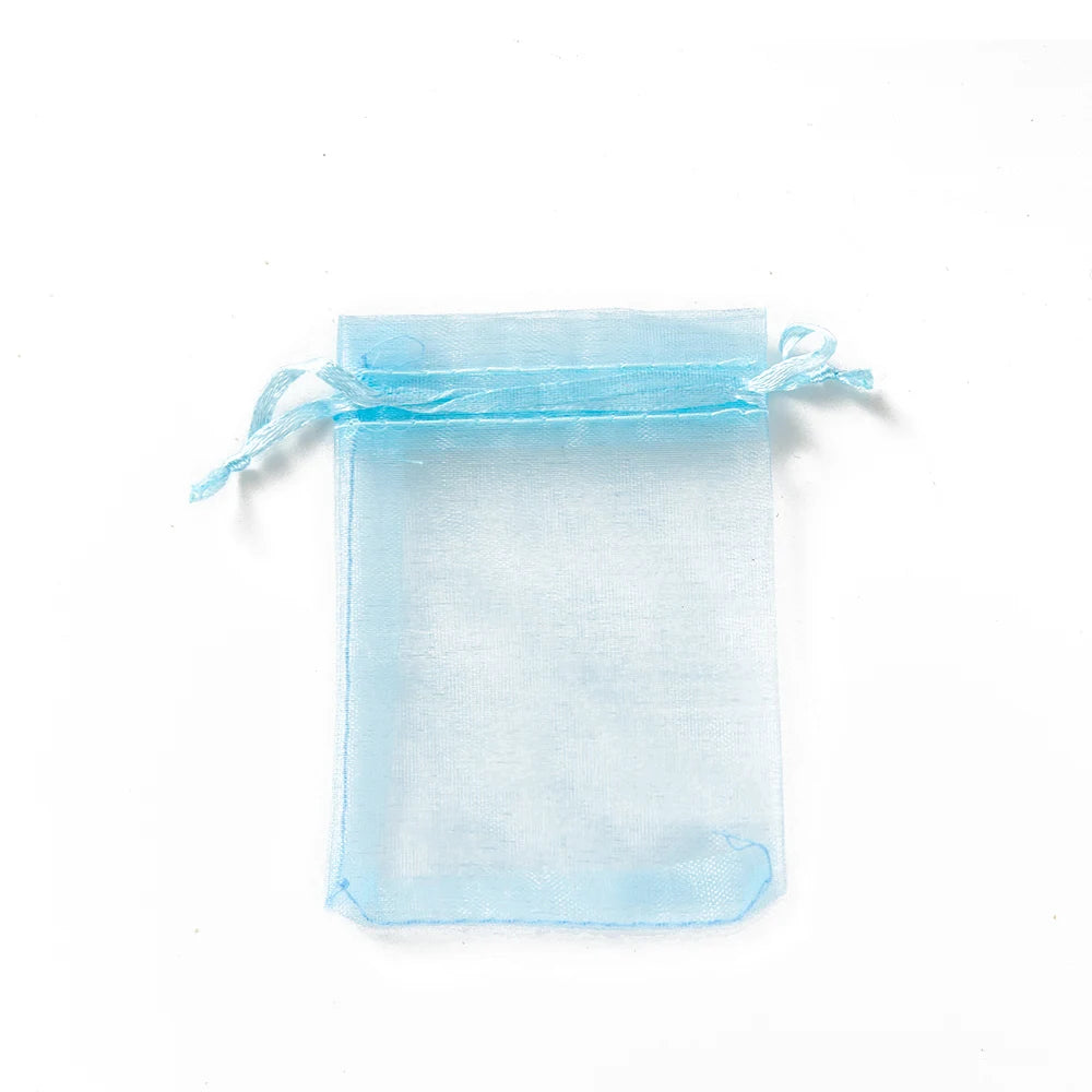 Sacchetti regalo con coulisse color oro e colorati per eventi.