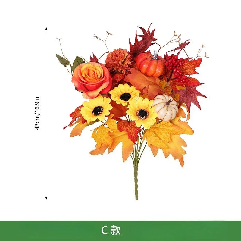 Ramo navideño de naranjas, girasoles artificiales y hojas de arce