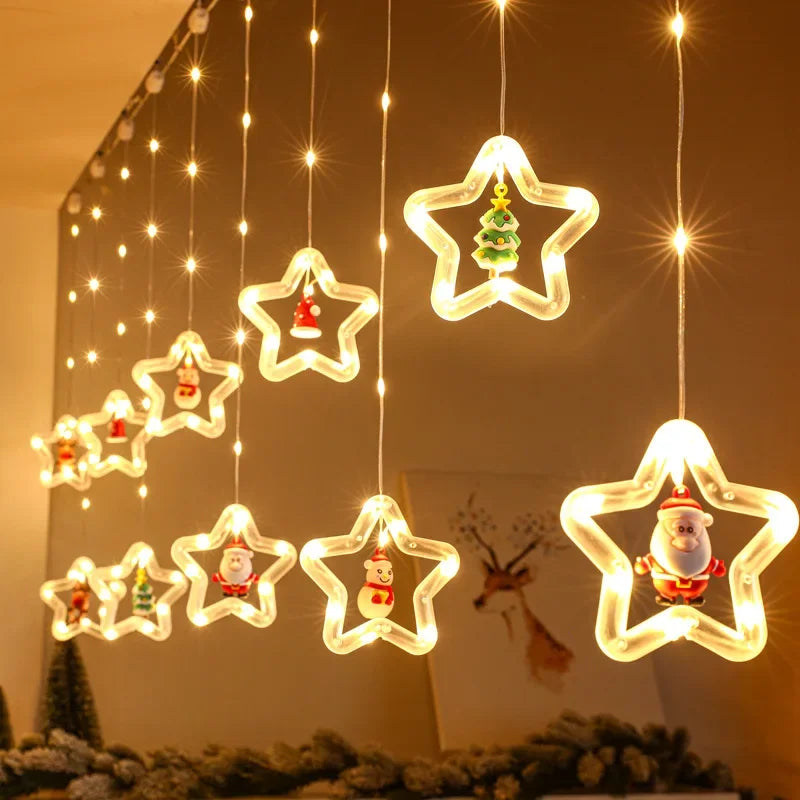Cortina de luces navideñas con forma de estrella y Papá Noel.