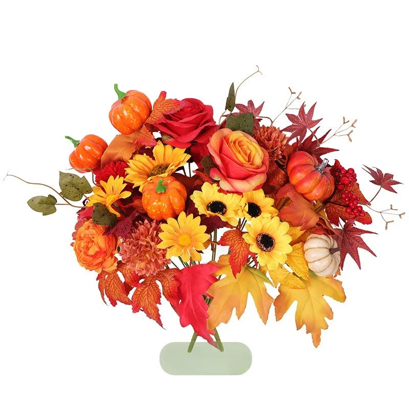 Ramo navideño de naranjas, girasoles artificiales y hojas de arce