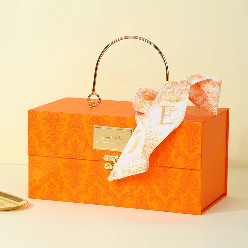 Scatola regalo in metallo con sciarpa di lusso.