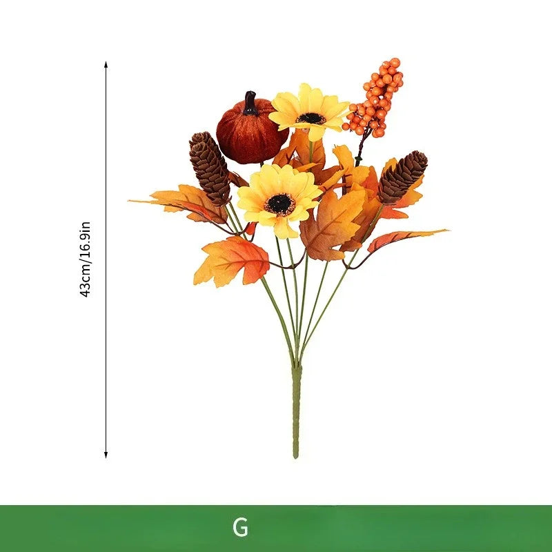 Ramo navideño de naranjas, girasoles artificiales y hojas de arce