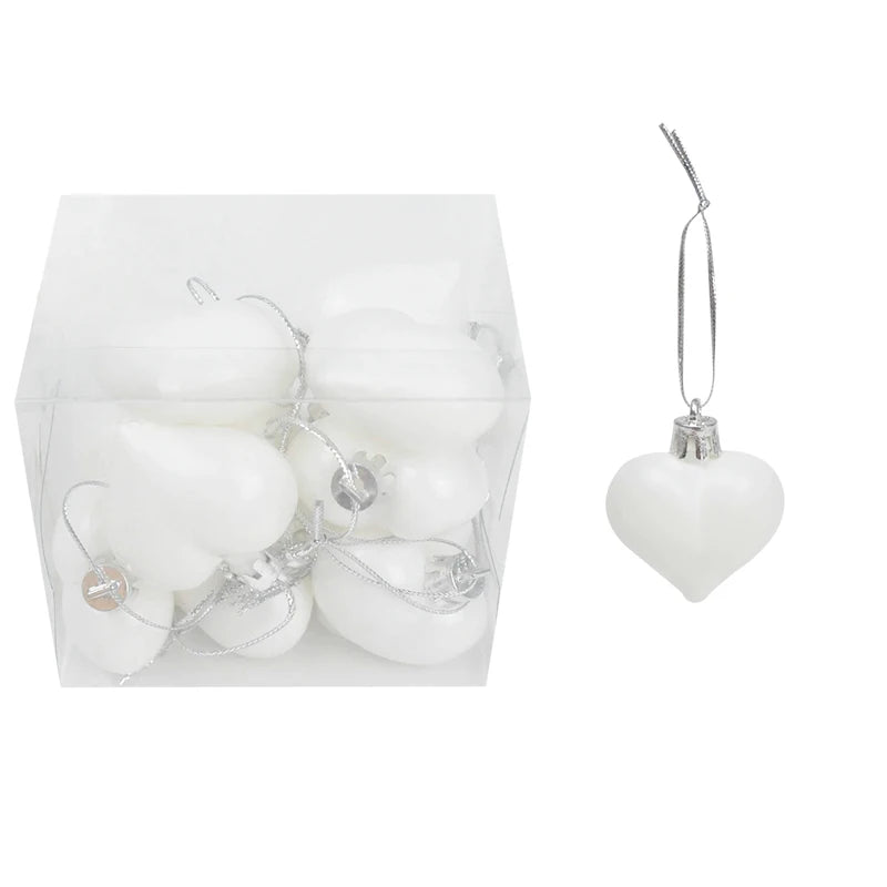 Adorno de bolas navideñas de plástico en caja, en colores rosa y dorado surtidos.