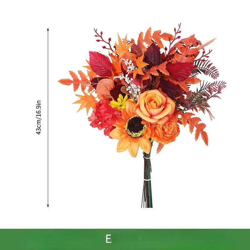 Ramo navideño de naranjas, girasoles artificiales y hojas de arce