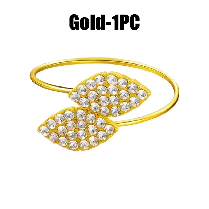 Anelli per tovaglioli con foglie, eleganti decorazioni da tavola in foglia d'oro.