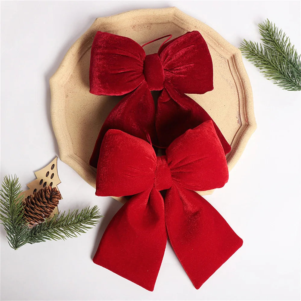 Decoración para árbol de Navidad con lazo de terciopelo rojo.