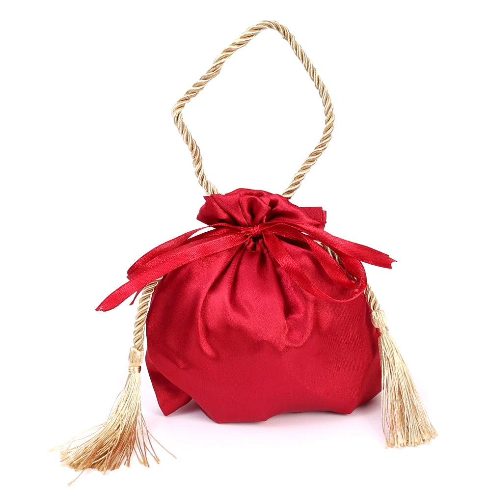 Sacchetto di stoffa con coulisse per i regali degli ospiti delle nozze, colore rosso.