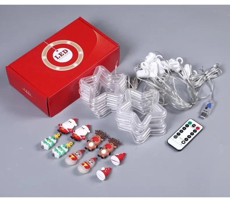 Cortina de luces navideñas con forma de estrella y Papá Noel.