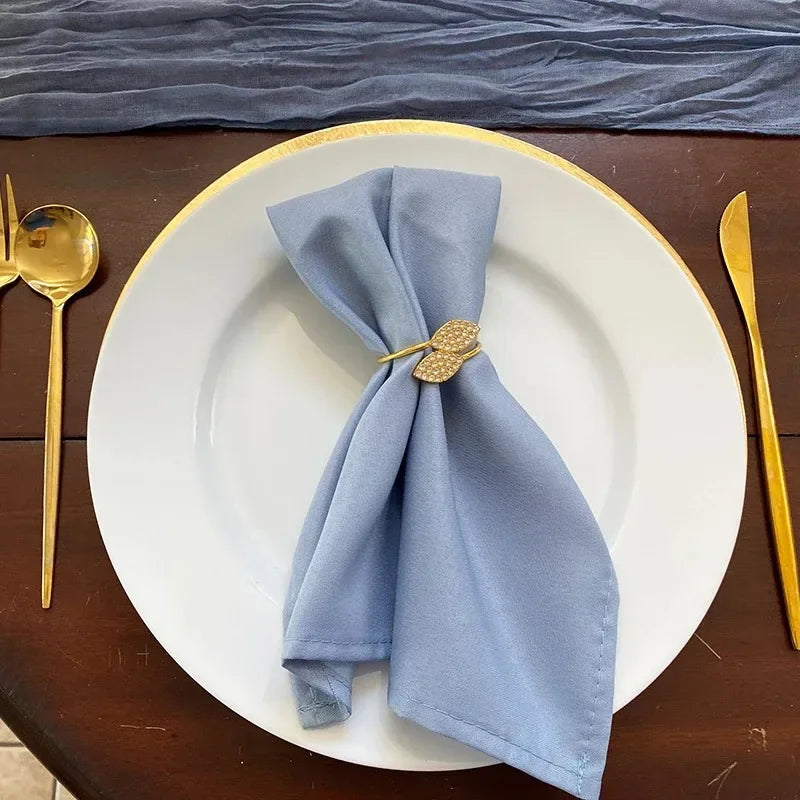 Anelli per tovaglioli con foglie, eleganti decorazioni da tavola in foglia d'oro.