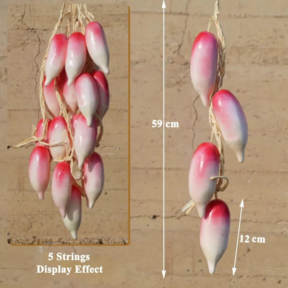 Künstliche Schnüre bilden verschiedene Gemüse- und Obstsorten nach.