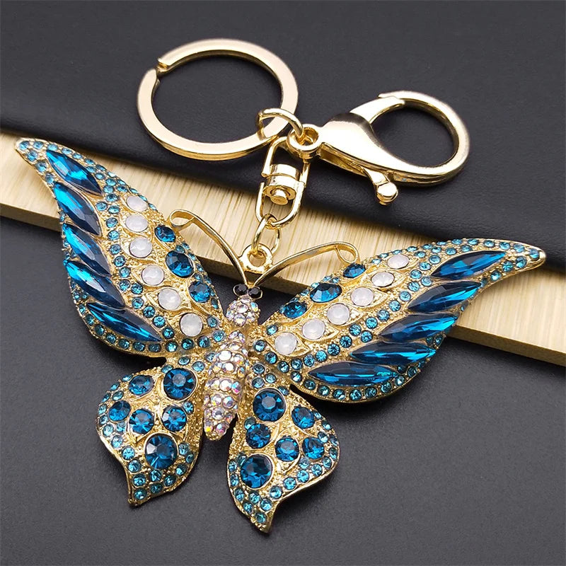 Portachiavi con ciondolo a farfalla in strass colorati color oro
