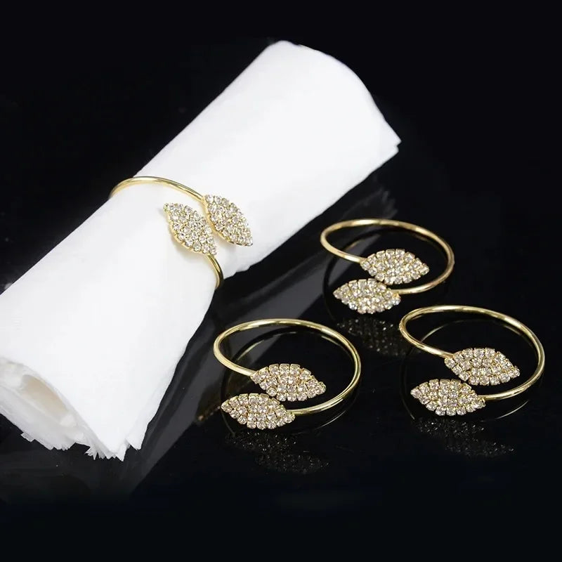 Anelli per tovaglioli con foglie, eleganti decorazioni da tavola in foglia d'oro.