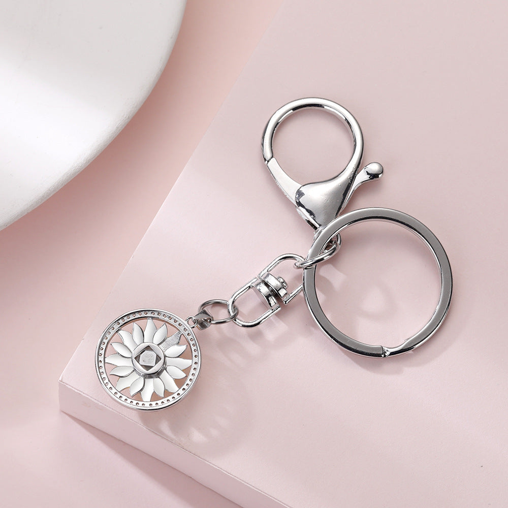 Llavero con proyección de fotos de margaritas