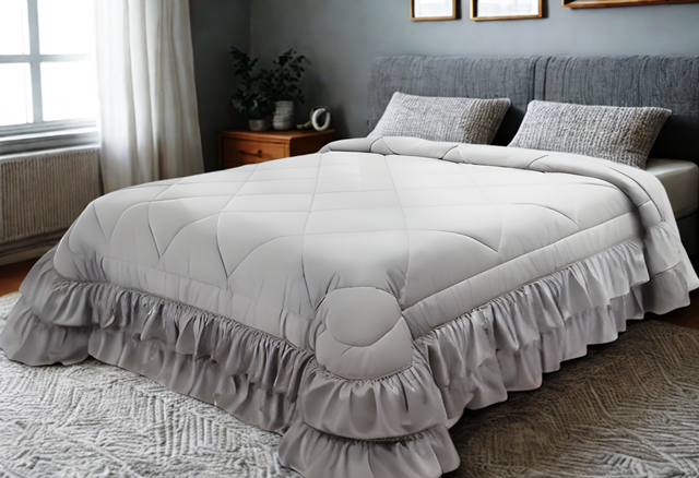 Trapunta Cassandra in velluto di cotone doppia rouche